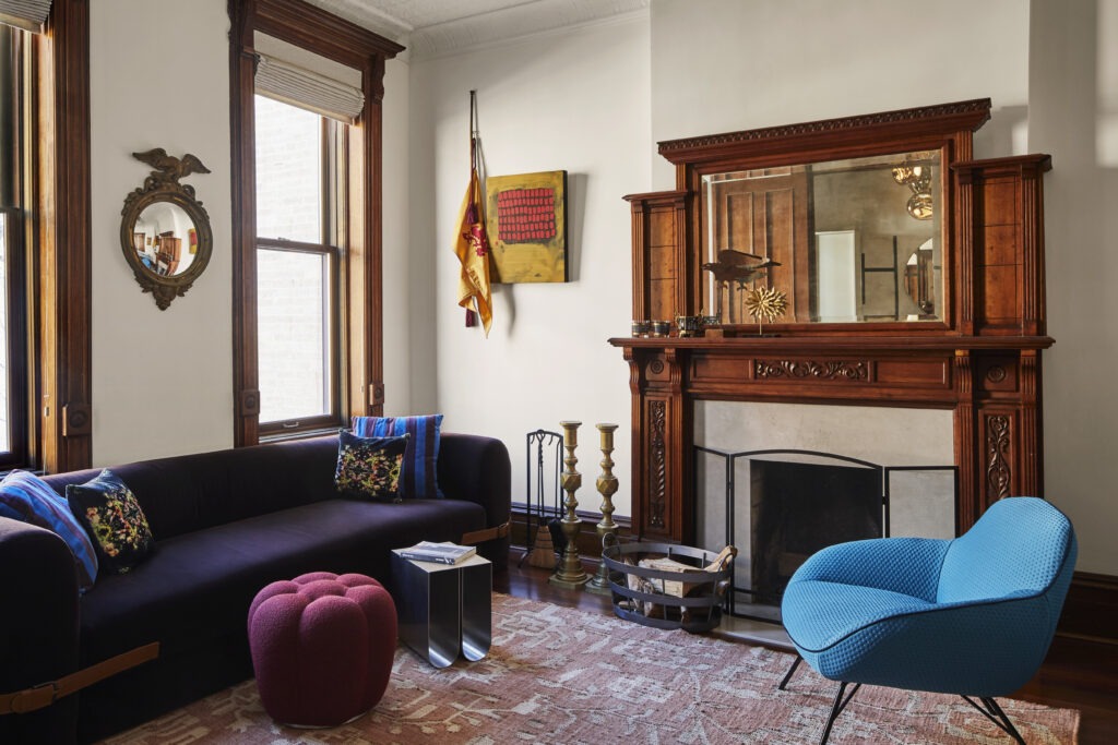 Park Slope townhouse living room with contemporary furniture and sculptural lighting.